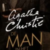 De man in het bruine pak